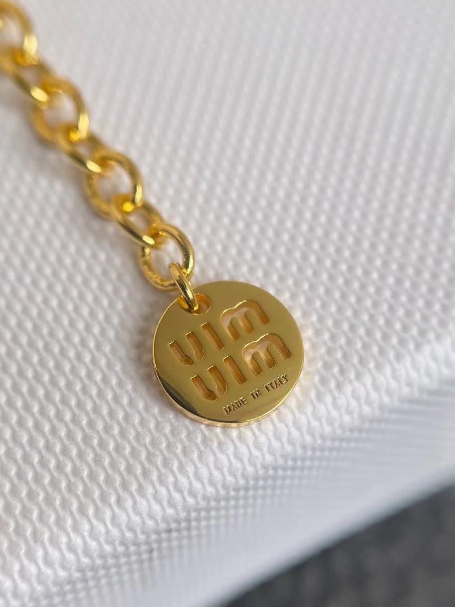 Miu Miu necklace with red circular pendant